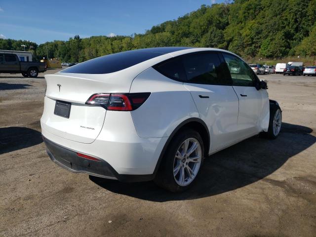 Photo 4 from auction – 2021 TESLA MODEL Y with VIN 5YJYGDEE0MF203147