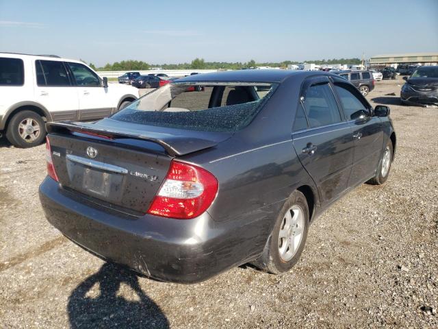 Photo 4 from auction – 2002 TOYOTA CAMRY LE with VIN JTDBE32K520024498