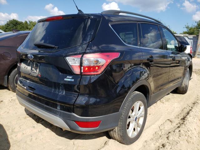 Photo 4 from auction – 2018 FORD ESCAPE SE with VIN 1FMCU9GD2JUB34738
