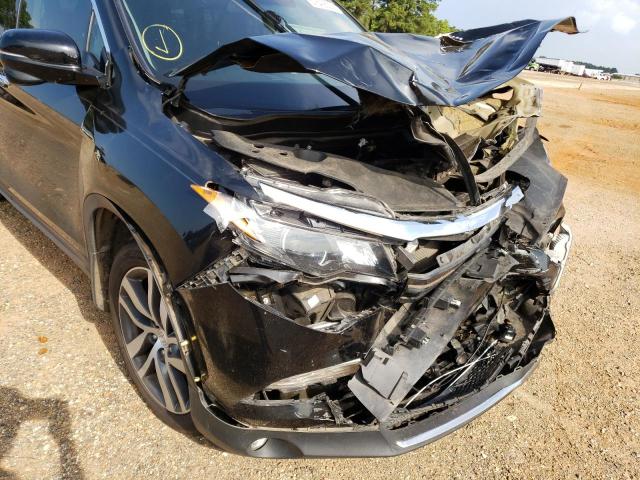 Photo 9 from auction – 2017 HONDA PILOT TOUR with VIN 5FNYF5H96HB046673