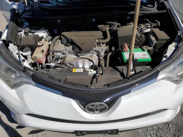 Photo 7 from auction – 2017 TOYOTA RAV4 LE with VIN JTMZFREV5HJ132434