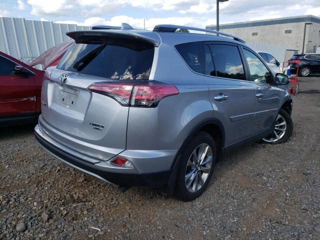 Photo 4 from auction – 2018 TOYOTA RAV4 LIMIT with VIN JTMDFREV4JD247251