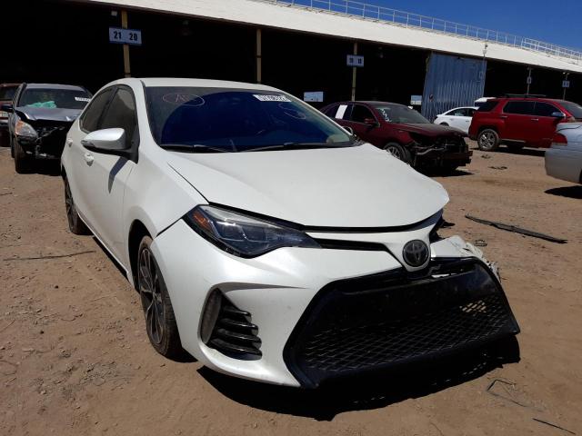 TOYOTA COROLLA L 2017 with VIN 5YFBURHE5HP719408 - Photo from auction