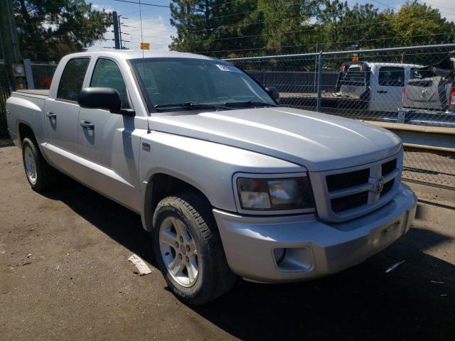 DODGE DAKOTA SLT 2011 with VIN 1D7RW3GP8BS679474 - Photo from auction