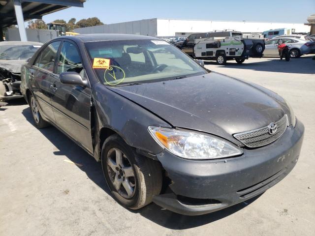 TOYOTA CAMRY LE 2003 with VIN 4T1BF30K23U552943 - Photo from auction