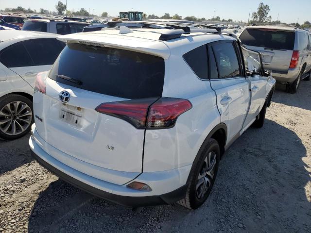 Photo 4 from auction – 2017 TOYOTA RAV4 LE with VIN JTMZFREV5HJ132434