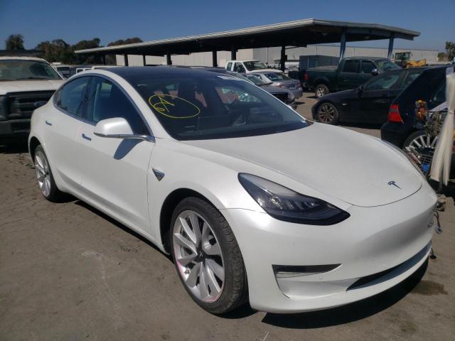 TESLA MODEL 3 2018 with VIN 5YJ3E1EB0JF185880 - Photo from auction