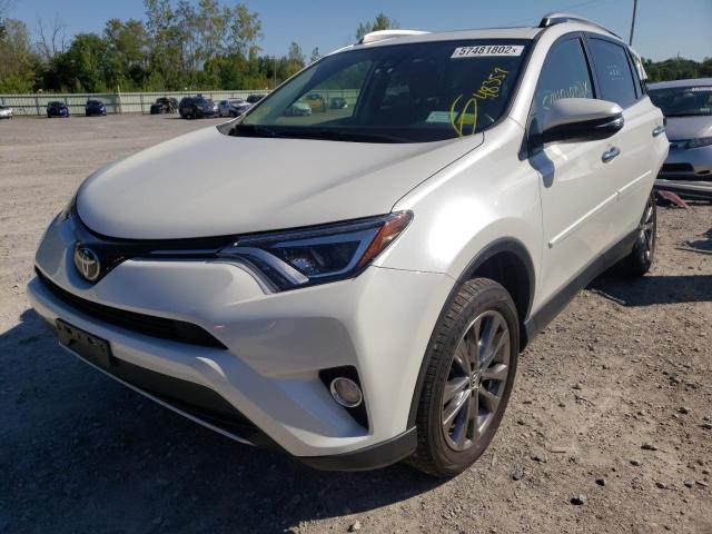 Photo 2 from auction – 2018 TOYOTA RAV4 LIMIT with VIN JTMDFREV4JJ246909