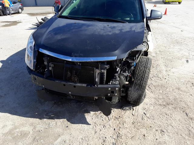 Photo 9 from auction – 2015 CADILLAC SRX with VIN 3GYFNAE38FS640411