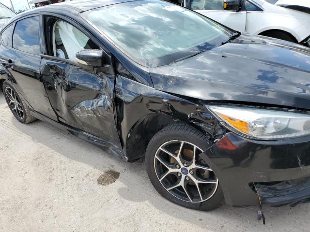 Photo 9 from auction – 2015 FORD FOCUS SE with VIN 1FADP3K21FL292090