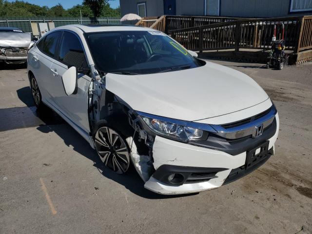 HONDA CIVIC EX 2018 with VIN JHMFC1F33JX020694 - Photo from auction