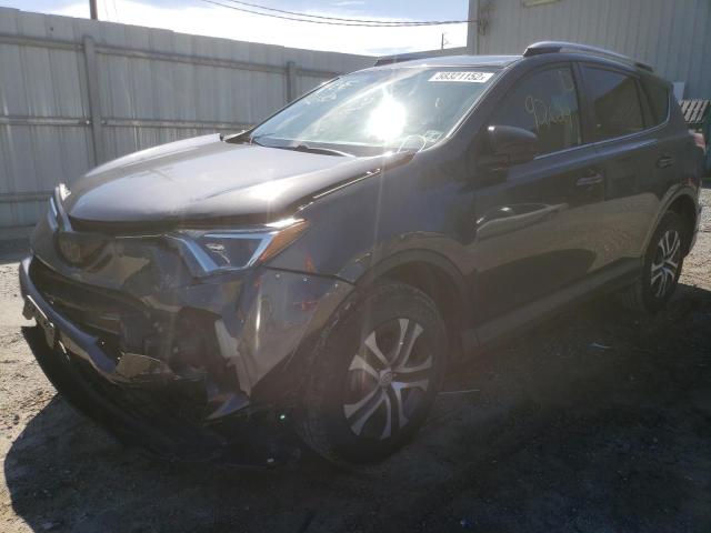 Photo 2 from auction – 2016 TOYOTA RAV4 LE with VIN JTMZFREV3GJ094278