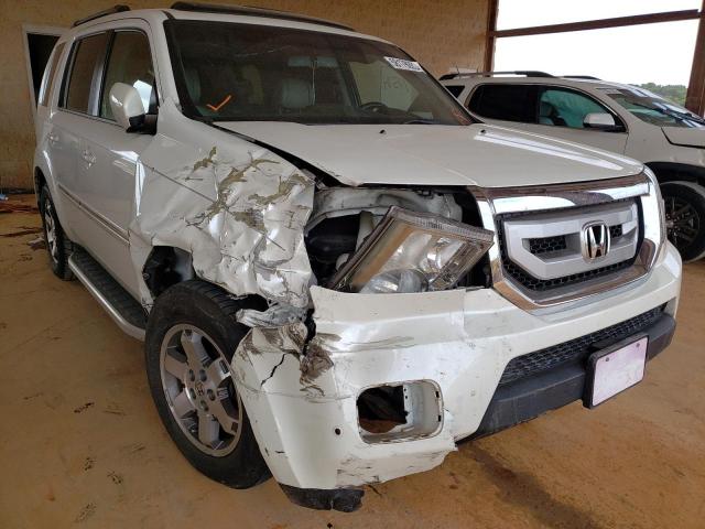 HONDA PILOT TOUR 2011 with VIN 5FNYF3H90BB056420 - Photo from auction