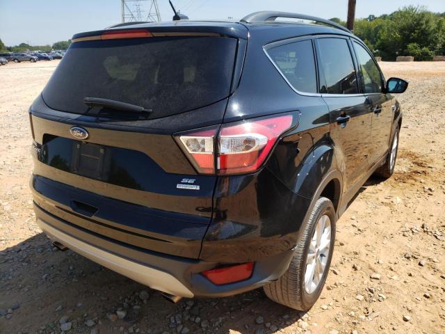 Photo 4 from auction – 2018 FORD ESCAPE SE with VIN 1FMCU0GD7JUA58087
