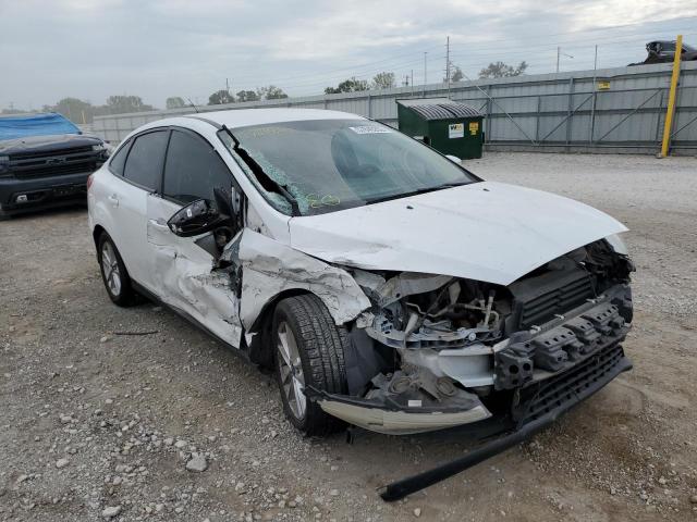 FORD FOCUS 4D 2016 with VIN 1FADP3F28GL245506 - Photo from auction