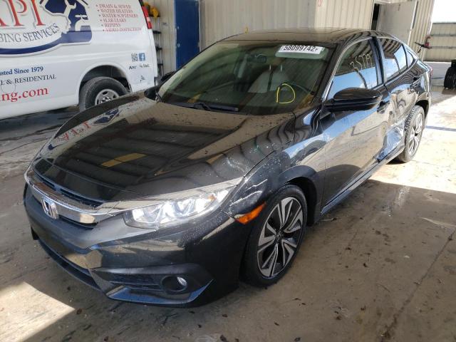 Photo 2 from auction – 2018 HONDA CIVIC EX with VIN JHMFC1F34JX009803