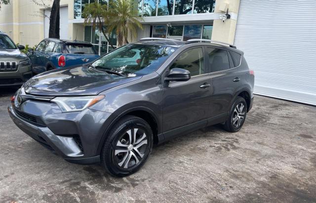 Photo 2 from auction – 2017 TOYOTA RAV4 LE with VIN JTMZFREV0HJ109353