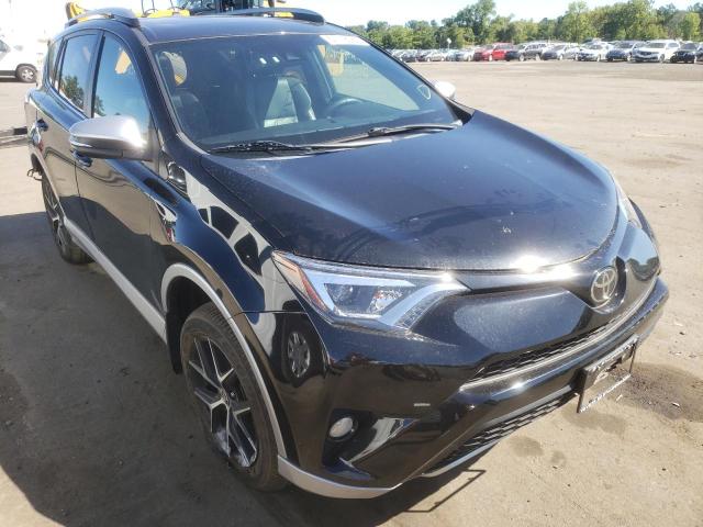 TOYOTA RAV4 SE 2018 with VIN 2T3JFREV2JW796839 - Photo from auction