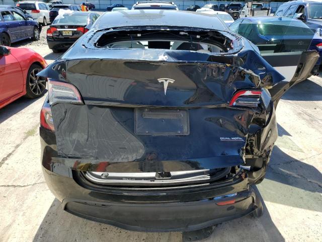 Photo 9 from auction – 2022 TESLA MODEL Y with VIN 7SAYGDEF2NF409809