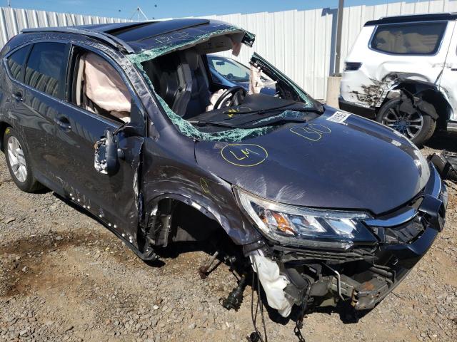 Photo 9 from auction – 2015 HONDA CR-V EXL with VIN 2HKRM4H71FH611591
