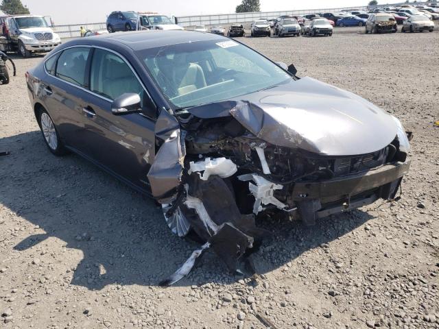 TOYOTA AVALON HYB 2014 with VIN 4T1BD1EBXEU029725 - Photo from auction
