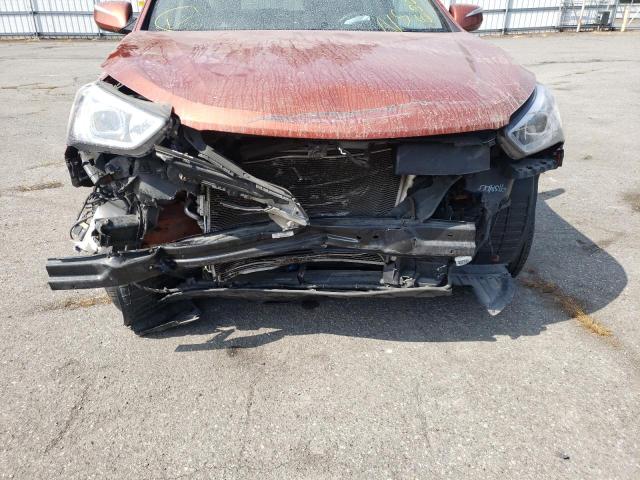 Photo 9 from auction – 2014 HYUNDAI SANTA FE S with VIN 5XYZUDLB2EG190899