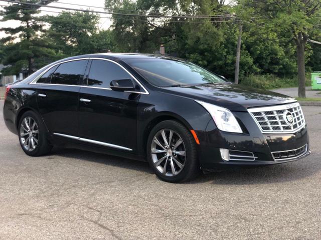 CADILLAC XTS 2014 with VIN 2G61U5S34E9219993 - Photo from auction