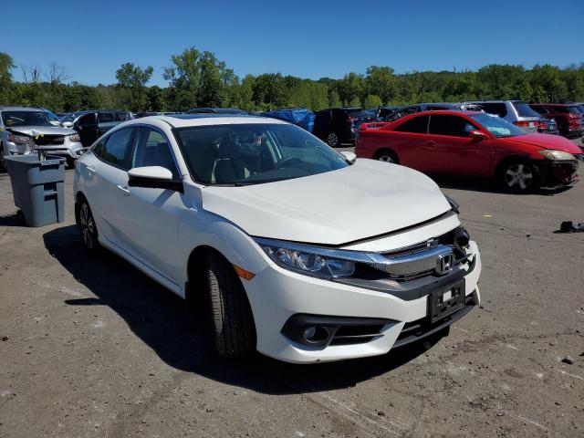 HONDA CIVIC EX 2017 with VIN 2HGFC1F32HH644732 - Photo from auction