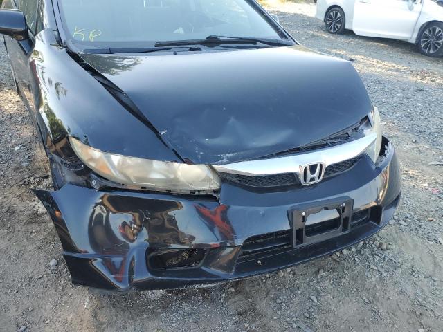 Photo 9 from auction – 2011 HONDA CIVIC LX with VIN 19XFA1F56BE029075