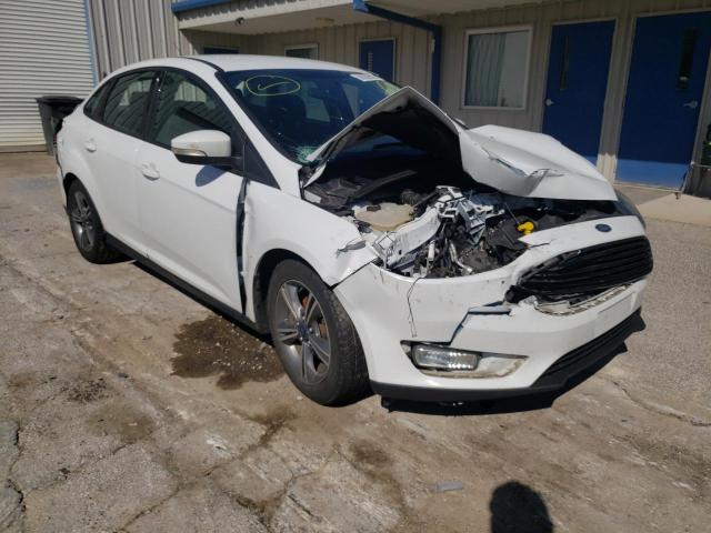 FORD FOCUS SE 2017 with VIN 1FADP3FE3HL243772 - Photo from auction