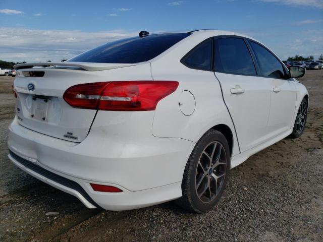 Photo 4 from auction – 2016 FORD FOCUS SE with VIN 1FADP3F29GL389811