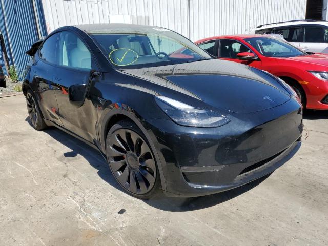 TESLA MODEL Y 2022 with VIN 7SAYGDEF2NF409809 - Photo from auction