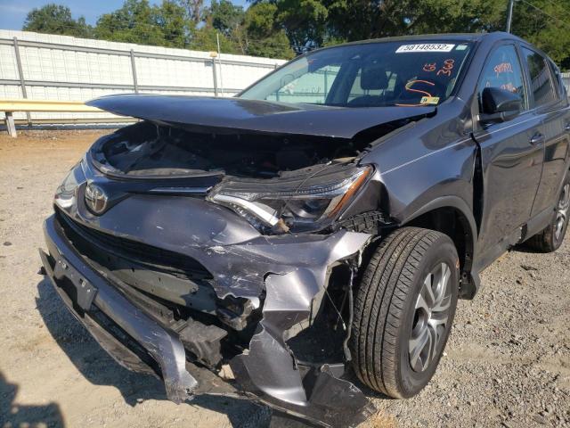 Photo 9 from auction – 2018 TOYOTA RAV4 LE with VIN 2T3ZFREV7JW505674