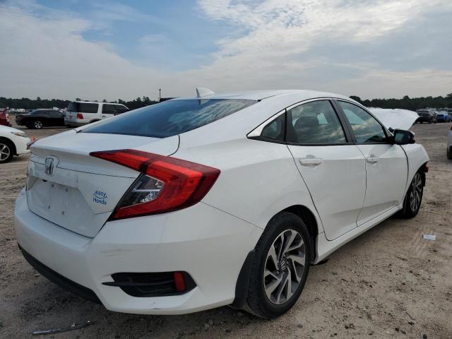 Photo 4 from auction – 2018 HONDA CIVIC EX with VIN 19XFC2F86JE040473
