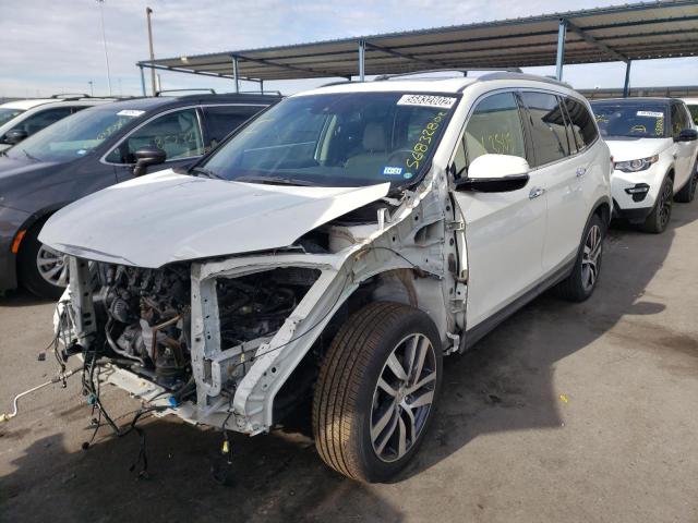 Photo 2 from auction – 2017 HONDA PILOT TOUR with VIN 5FNYF5H91HB032678