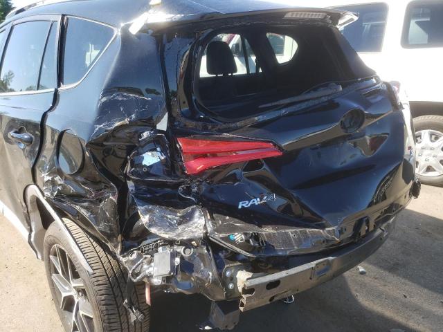 Photo 9 from auction – 2018 TOYOTA RAV4 SE with VIN 2T3JFREV2JW796839