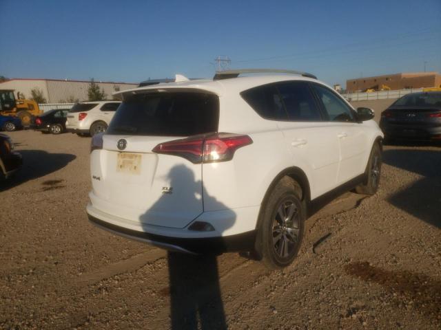Photo 4 from auction – 2016 TOYOTA RAV4 XLE with VIN JTMRFREV2GD177845