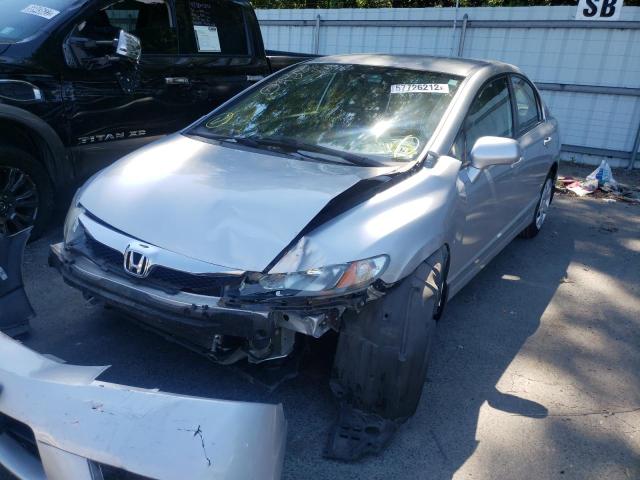 Photo 2 from auction – 2011 HONDA CIVIC LX with VIN 2HGFA1F59BH301558