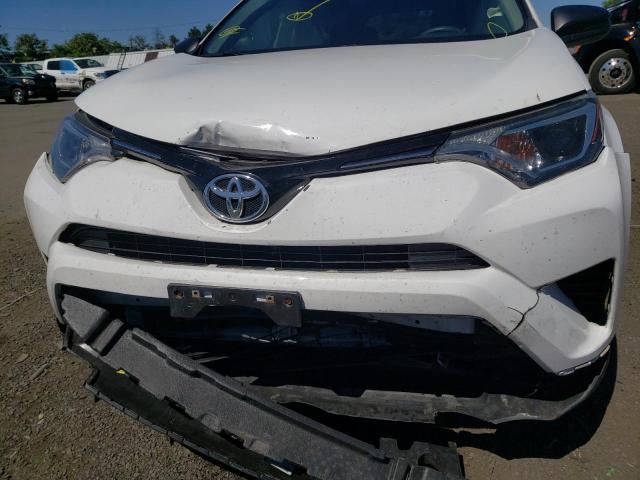 Photo 9 from auction – 2016 TOYOTA RAV4 LE with VIN JTMBFREV7GJ062094