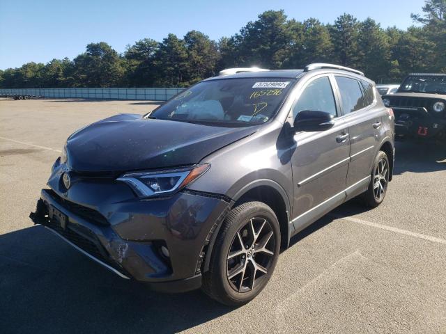 Photo 2 from auction – 2017 TOYOTA RAV4 SE with VIN JTMJFREV1HJ165296