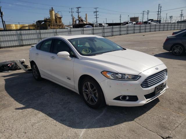 FORD FUSION TIT 2016 with VIN 3FA6P0SU5GR240165 - Photo from auction