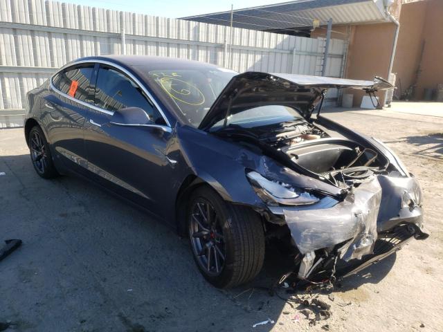 TESLA MODEL 3 2018 with VIN 5YJ3E1EA4JF011589 - Photo from auction