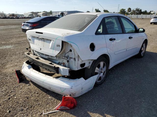 Photo 4 from auction – 2003 FORD FOCUS LX with VIN 1FAFP38Z03W255393