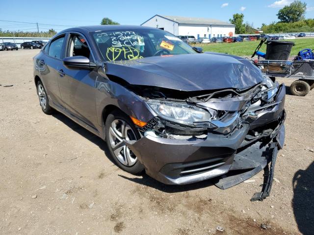 HONDA CIVIC LX 2018 with VIN 19XFC2F57JE015250 - Photo from auction