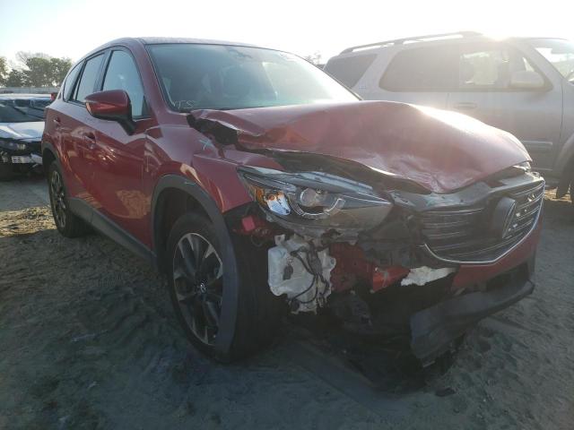MAZDA CX-5 GT 2016 with VIN JM3KE2DY7G0840073 - Photo from auction