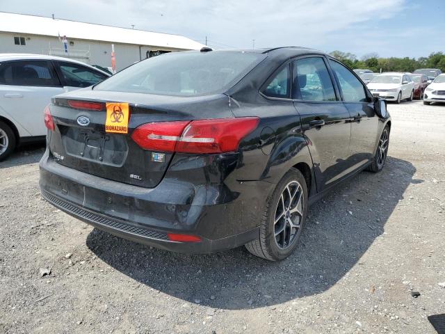 Photo 4 from auction – 2017 FORD FOCUS SEL with VIN 1FADP3H27HL299717