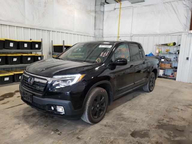 Photo 2 from auction – 2020 HONDA RIDGELINE with VIN 5FPYK3F82LB006293