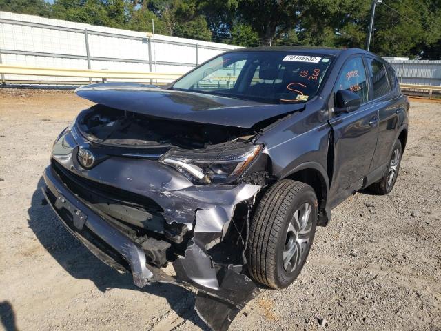 Photo 2 from auction – 2018 TOYOTA RAV4 LE with VIN 2T3ZFREV7JW505674