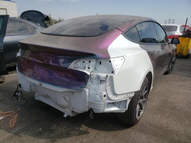 Photo 4 from auction – 2021 TESLA MODEL 3 with VIN 5YJ3E1EA5MF069473