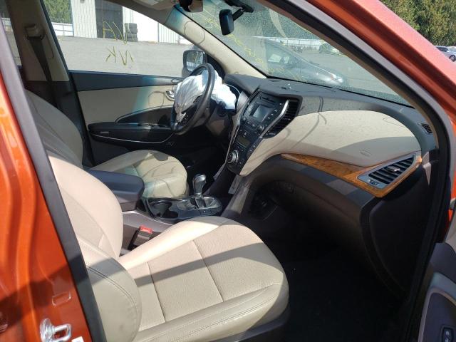 Photo 5 from auction – 2014 HYUNDAI SANTA FE S with VIN 5XYZUDLB2EG190899